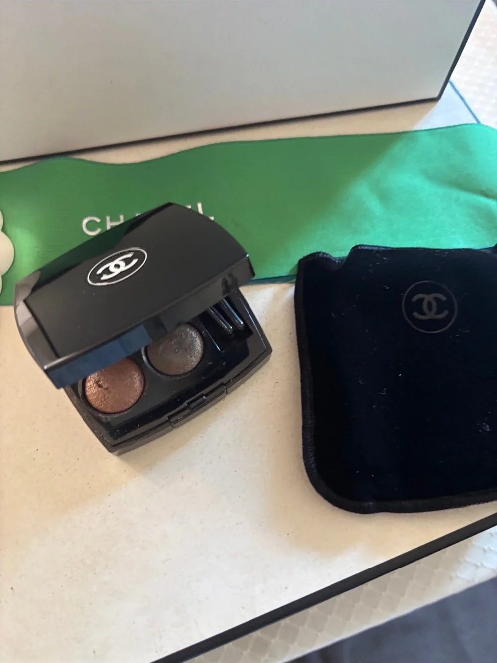 CHANEL Black Compact Case with White CC Emblem eye shadows